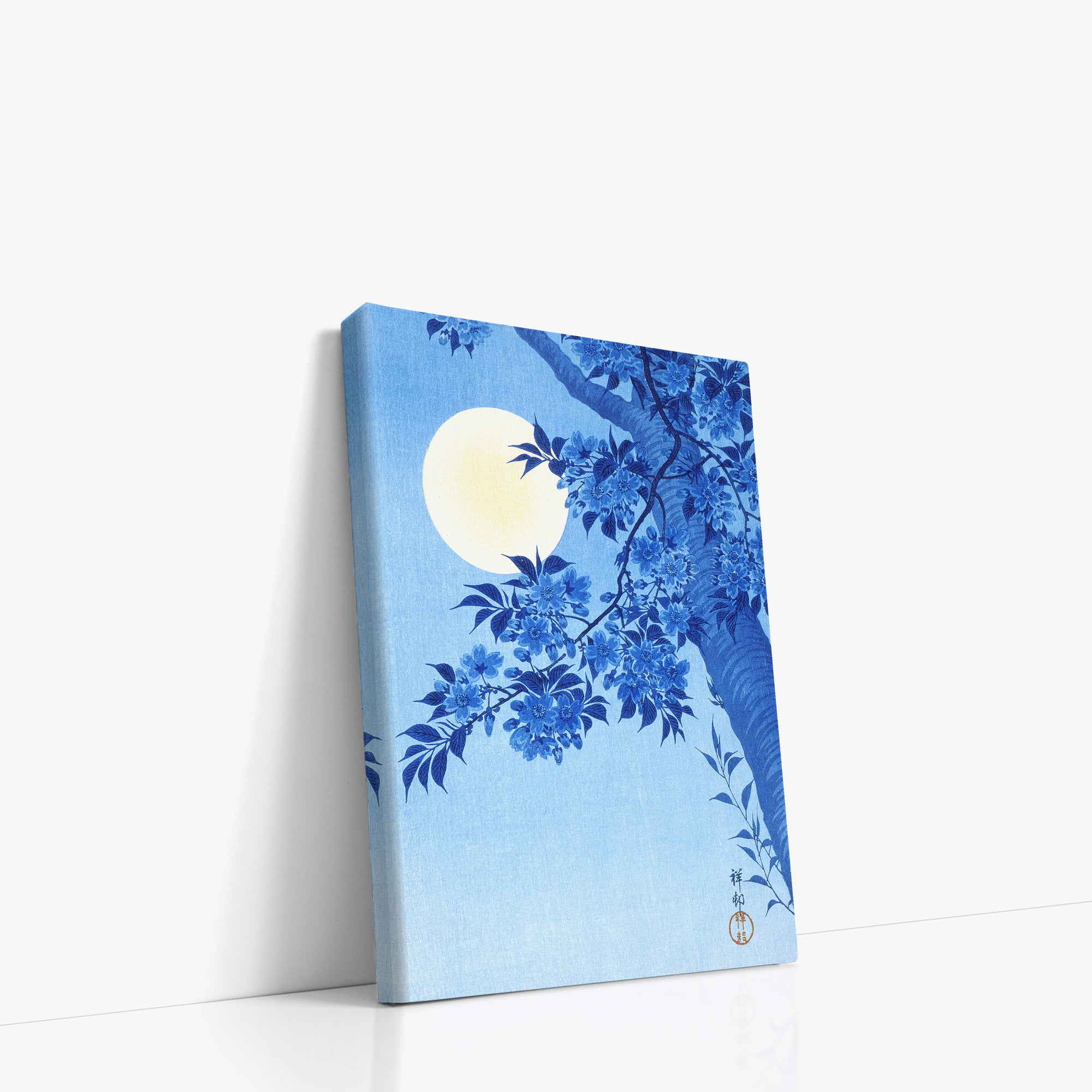 Cerisier en fleurs par une nuit de lune
