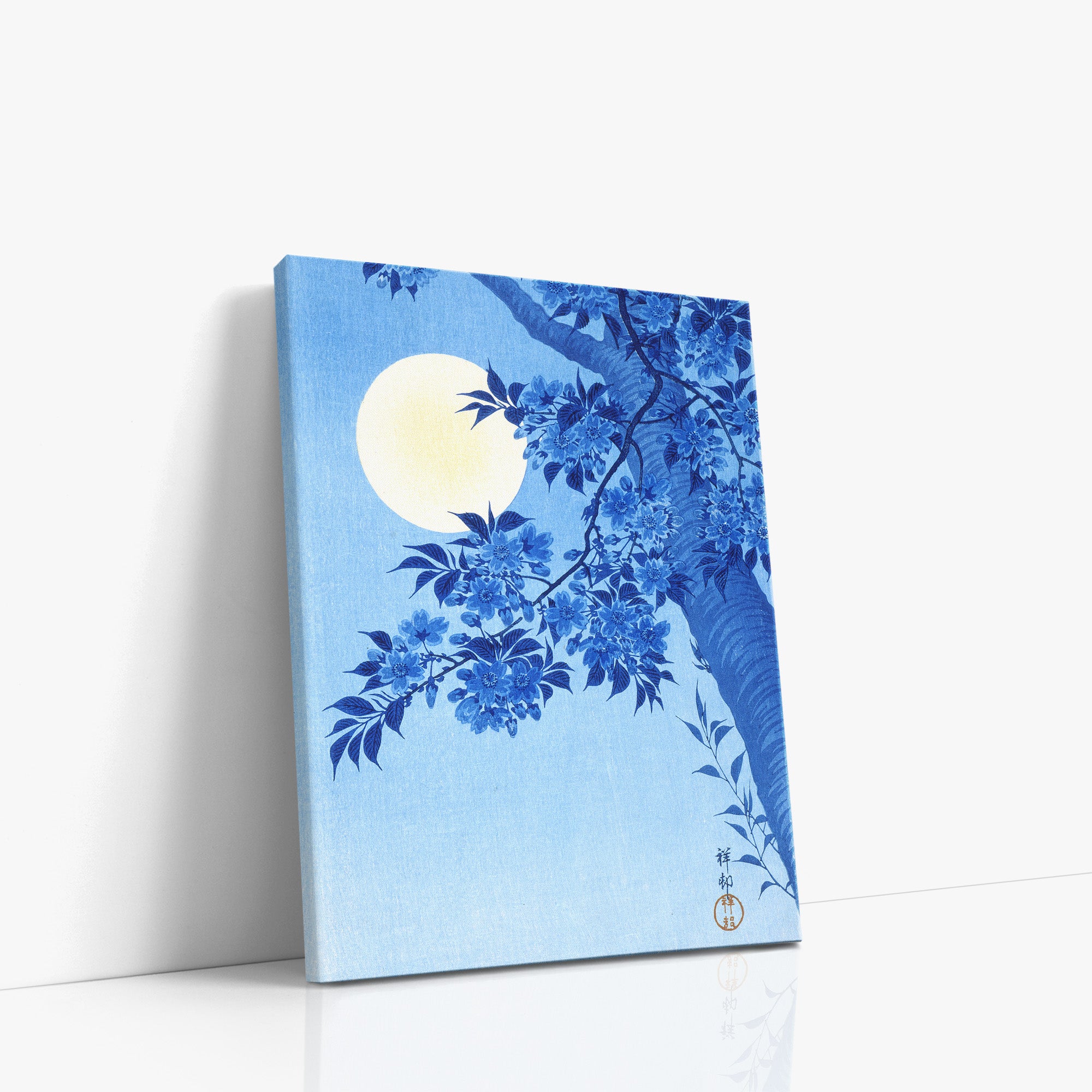 Cerisier en fleurs par une nuit de lune