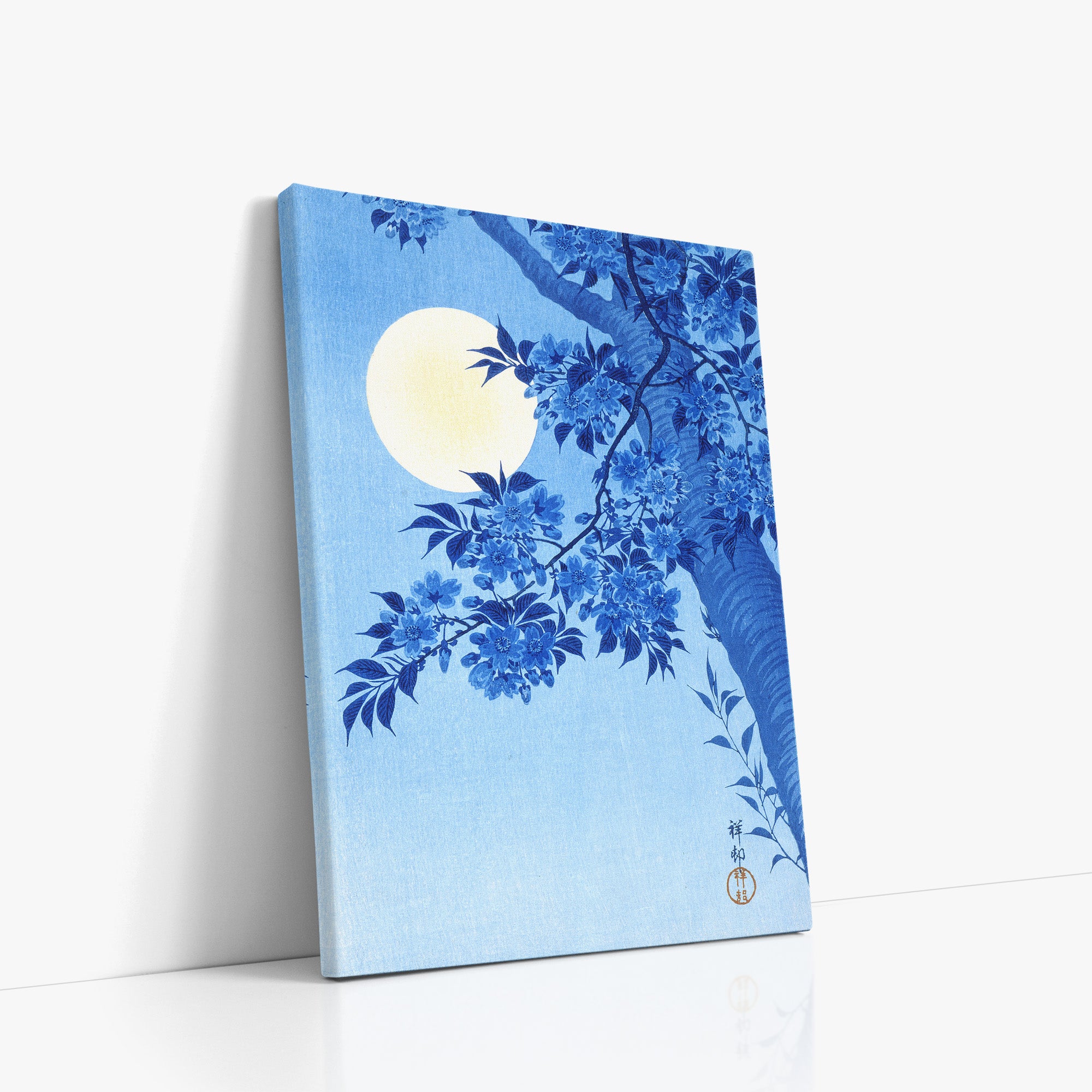 Cerisier en fleurs par une nuit de lune