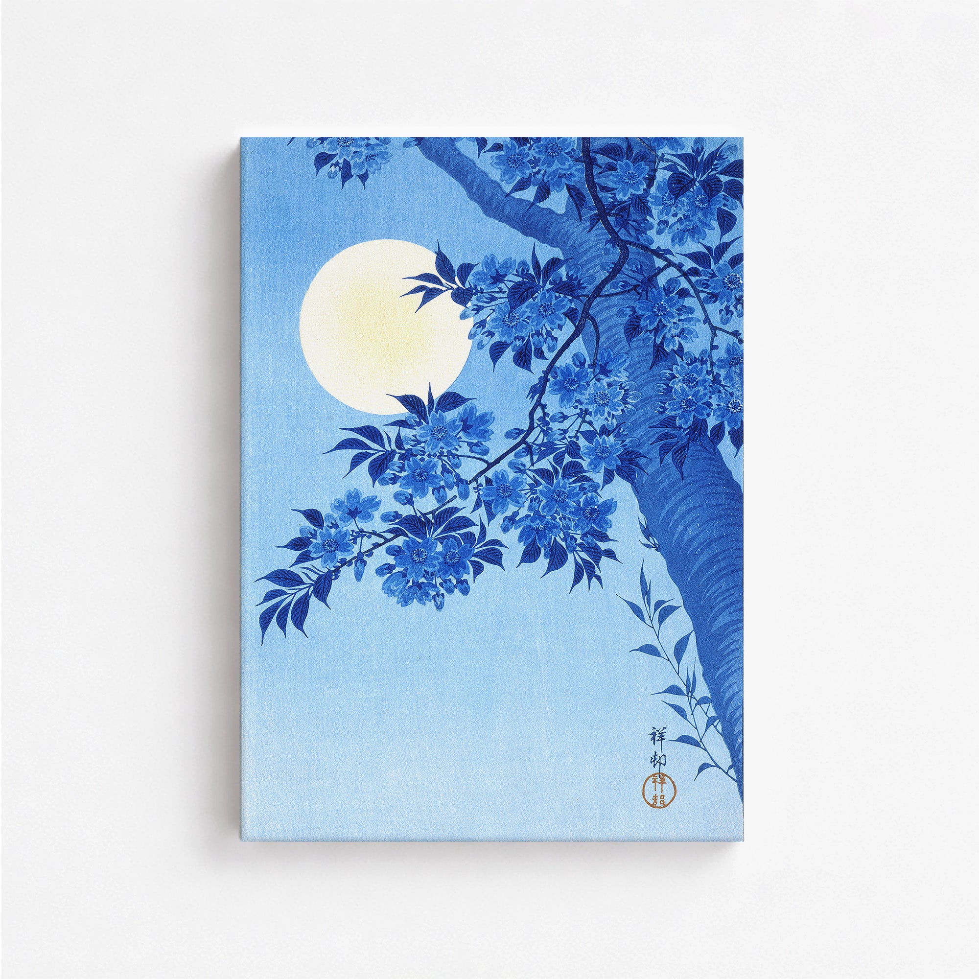 Cerisier en fleurs par une nuit de lune