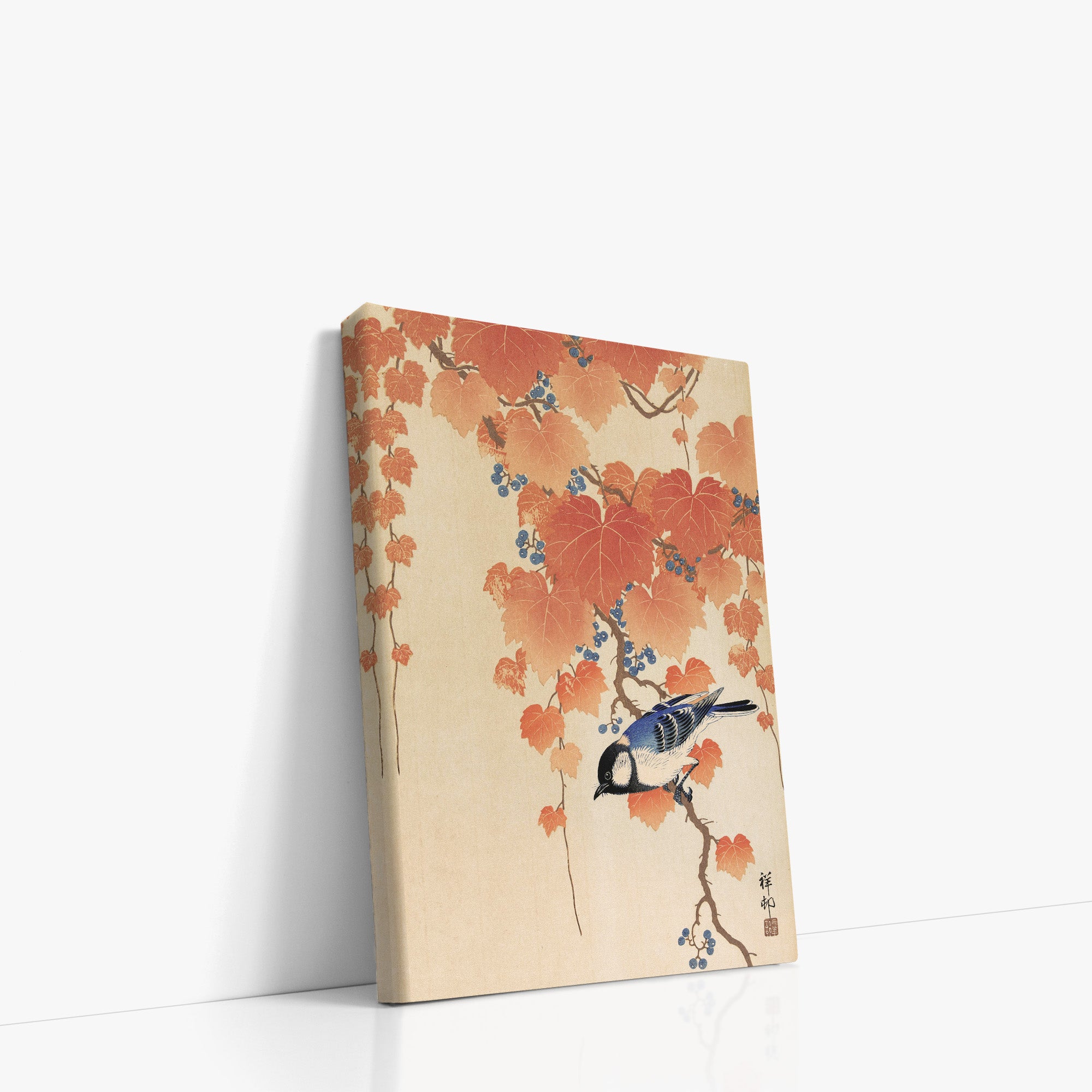 Grande mésange sur la branche de paulownia