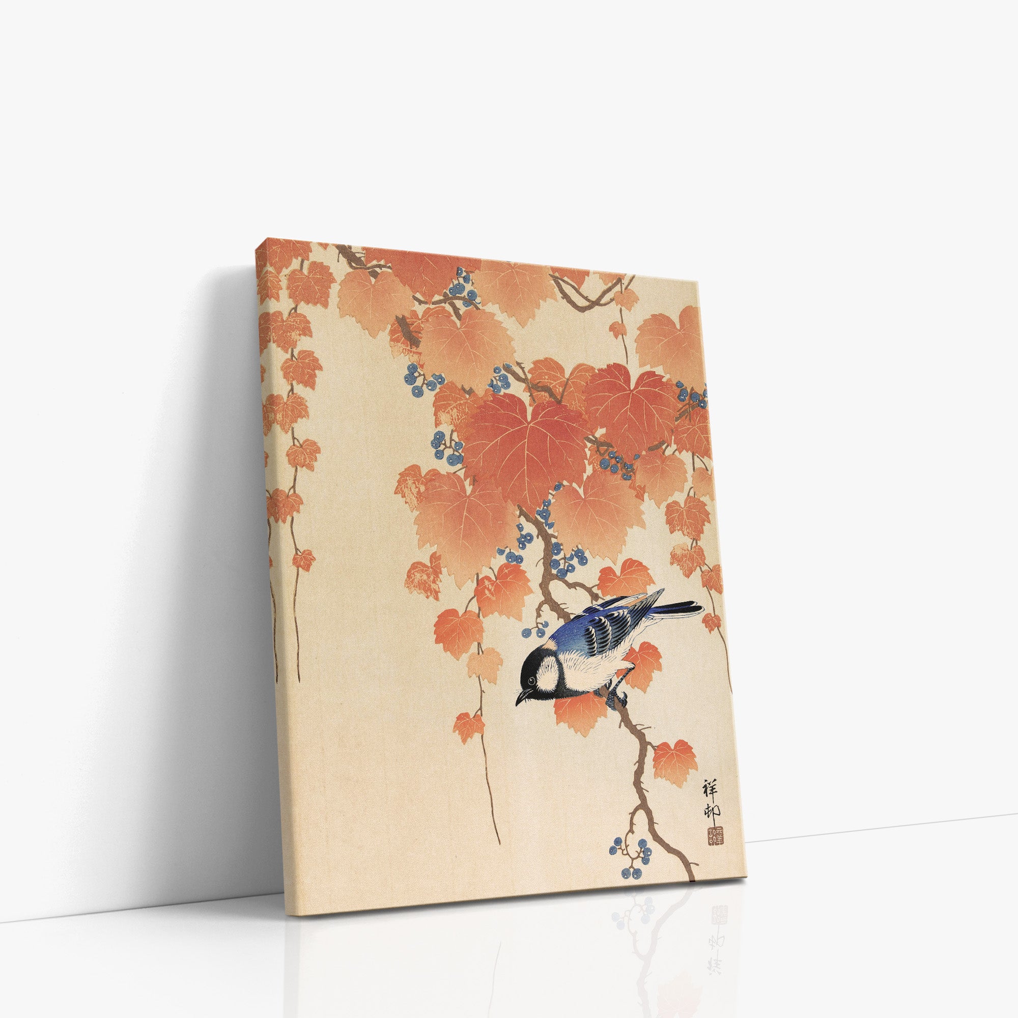 Grande mésange sur la branche de paulownia