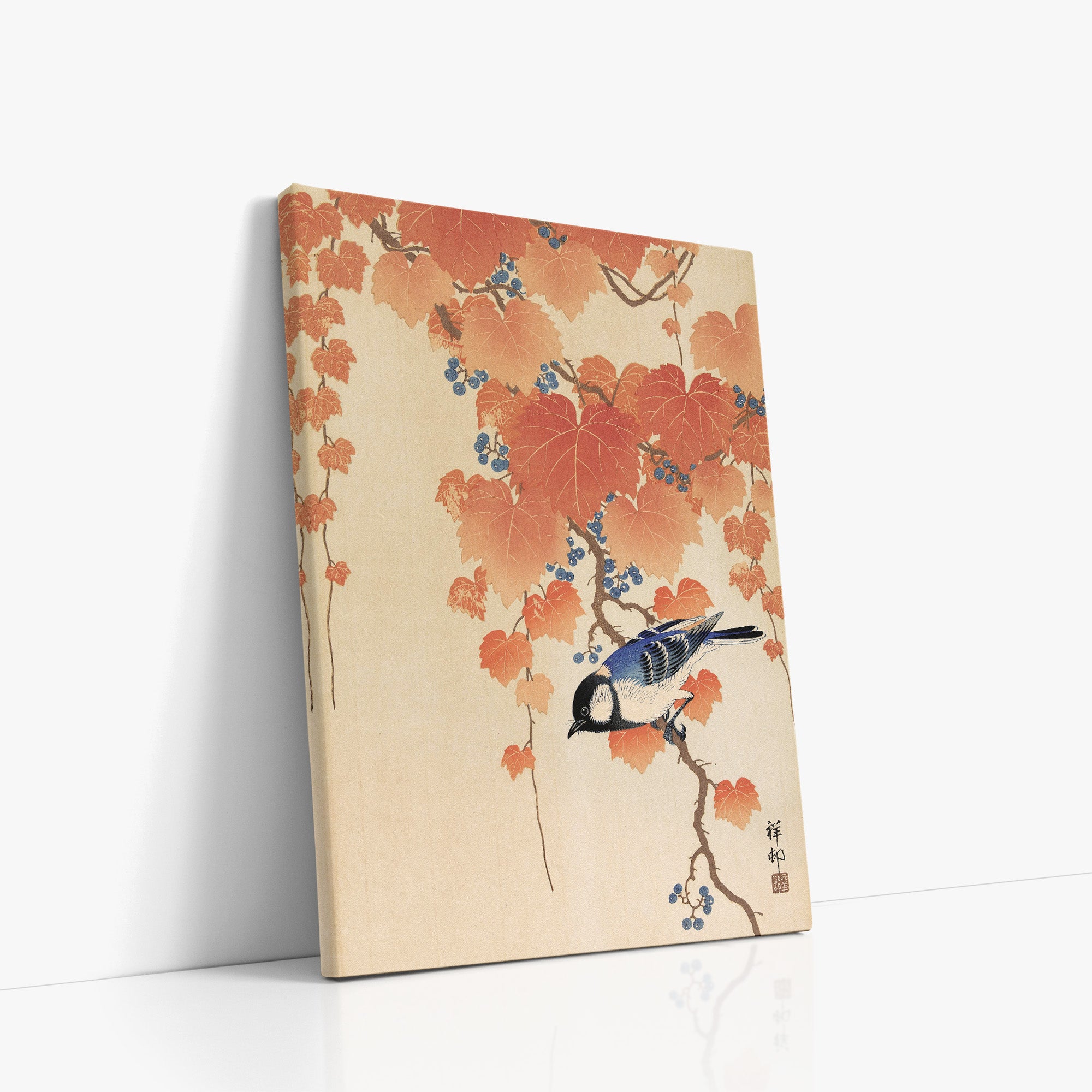 Grande mésange sur la branche de paulownia